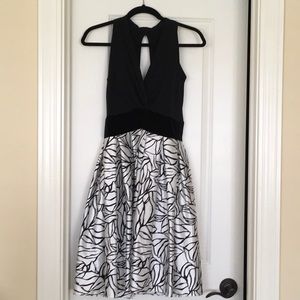 Cocktail dress with built in bra inserts. Size 2.